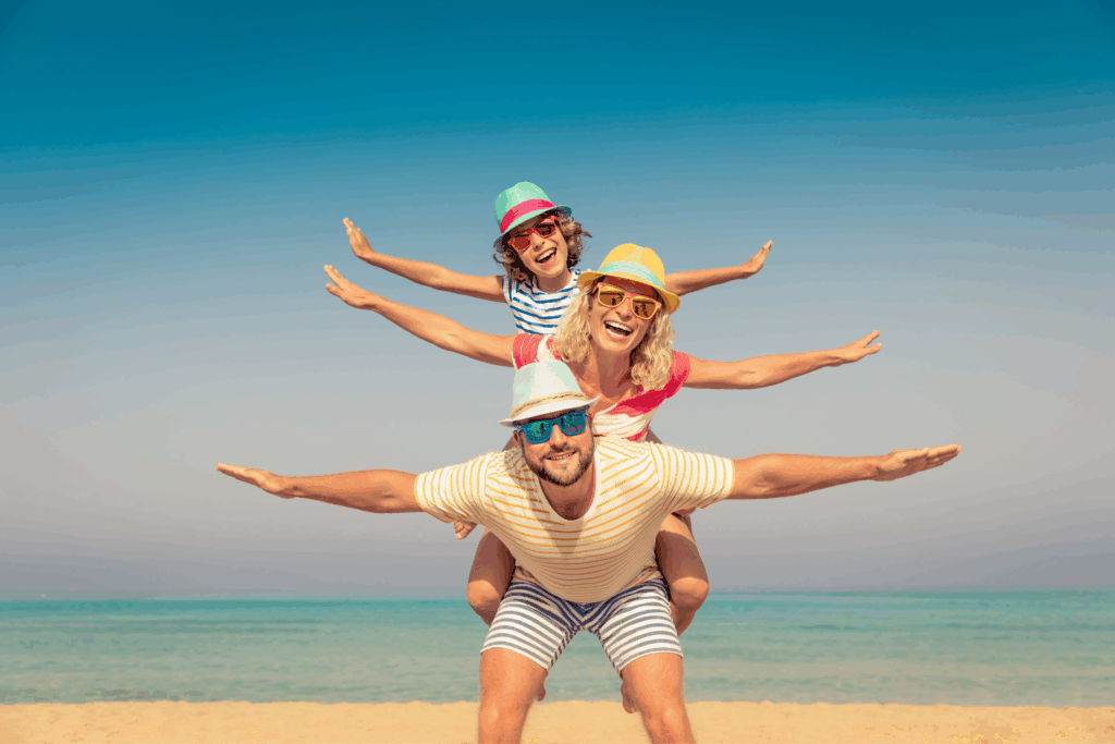 Family having fun in the sun on the beach